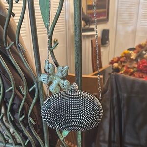 Joymax Mini silver metal purse with stone.